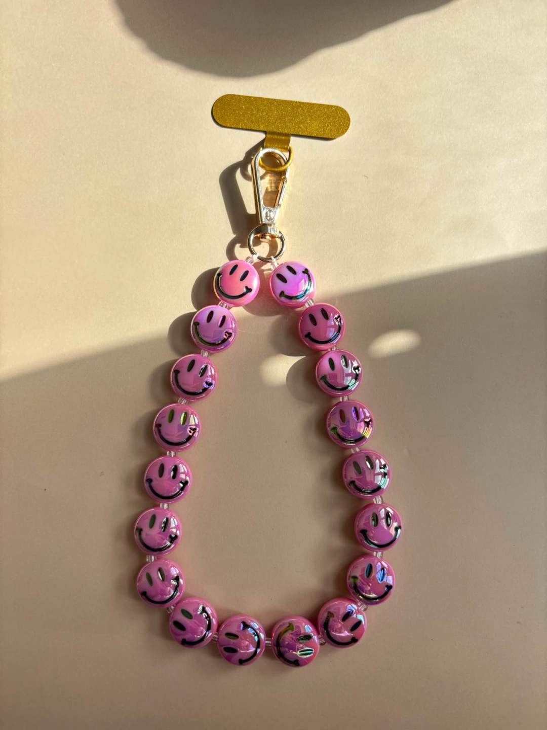 Telefoonkoord Smiley - roze