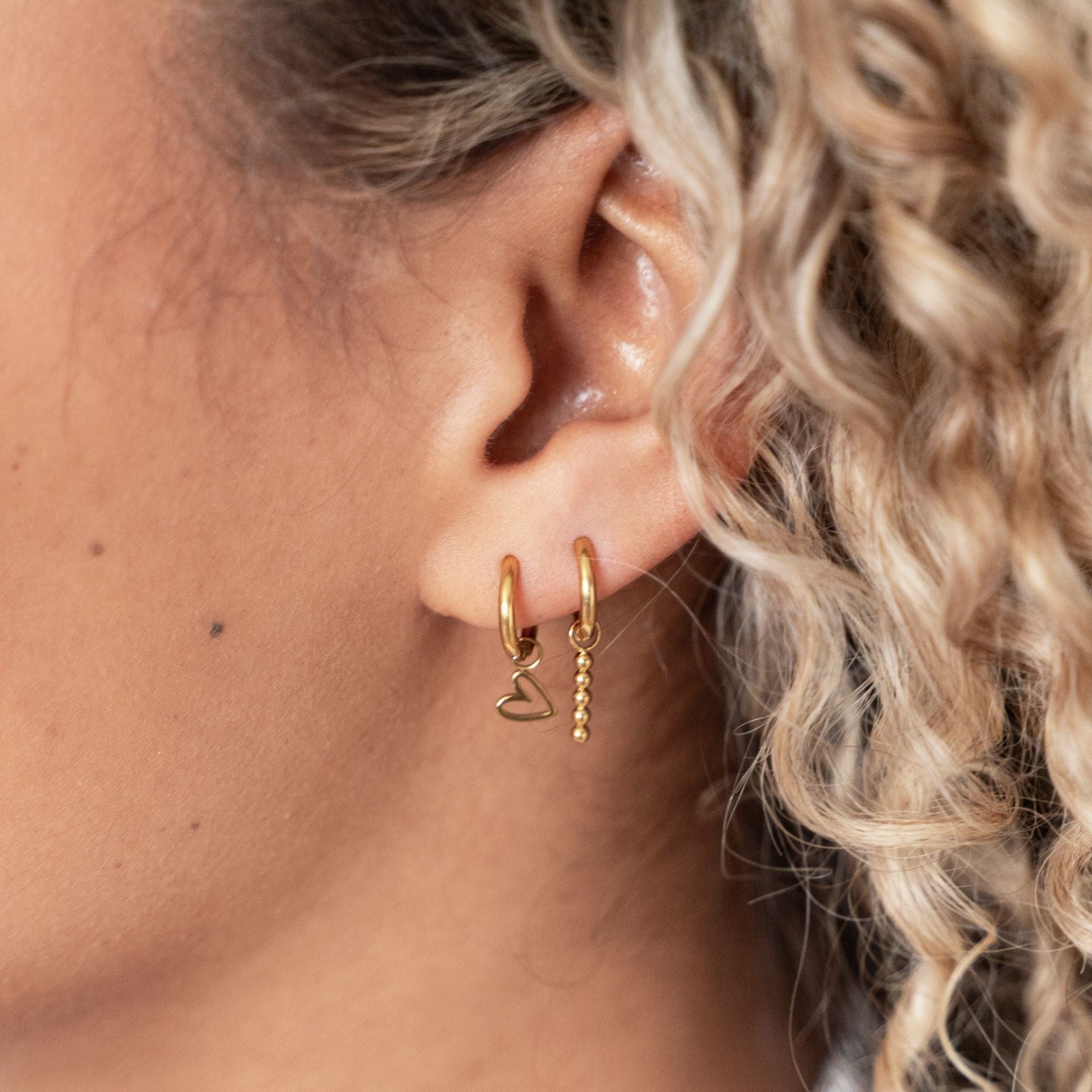 Oorbellen Tilted Open Heart